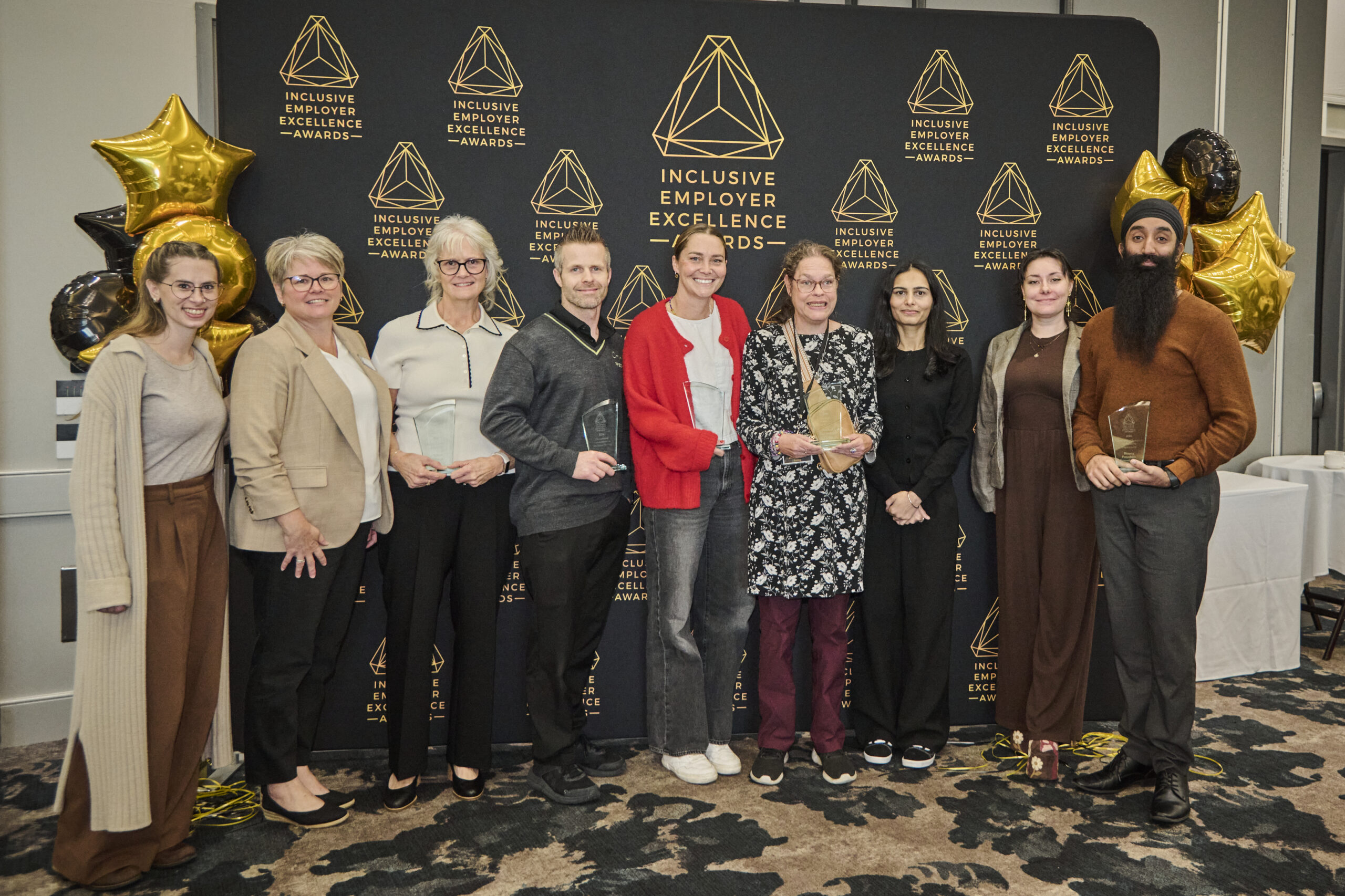 2026 IEEA award recipients. L-R: Tabor Village, Chalo Freshco, Foxglove Floral Café, Newleaf Total Wellness Centre, and Binary Freedom Foundation